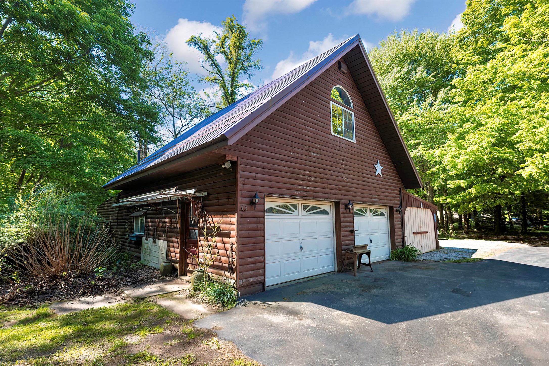 Detached 2- car garage with apt above.