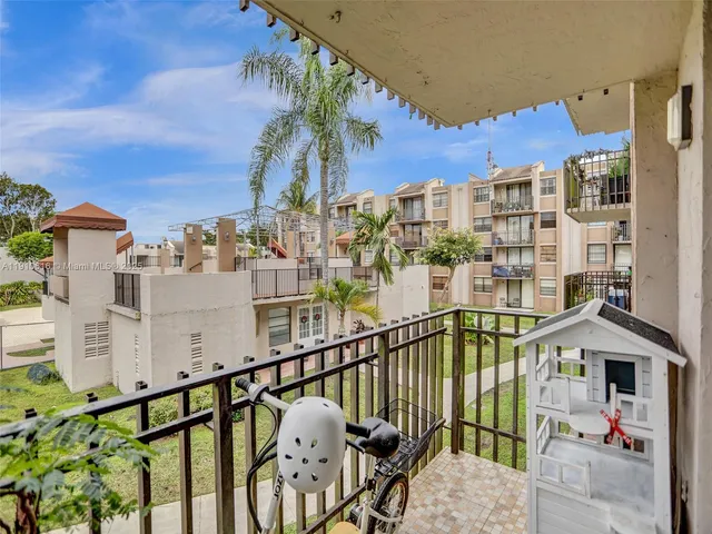 a view of swimming pool from a balcony