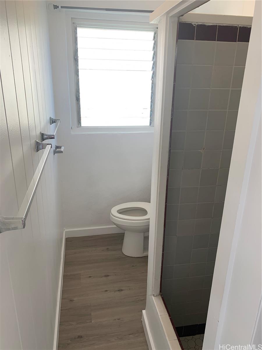 3121 Paliuli Street, Unit D Honolulu, HI 96816 - Photo 9 of 12 a bathroom with a toilet and a shower