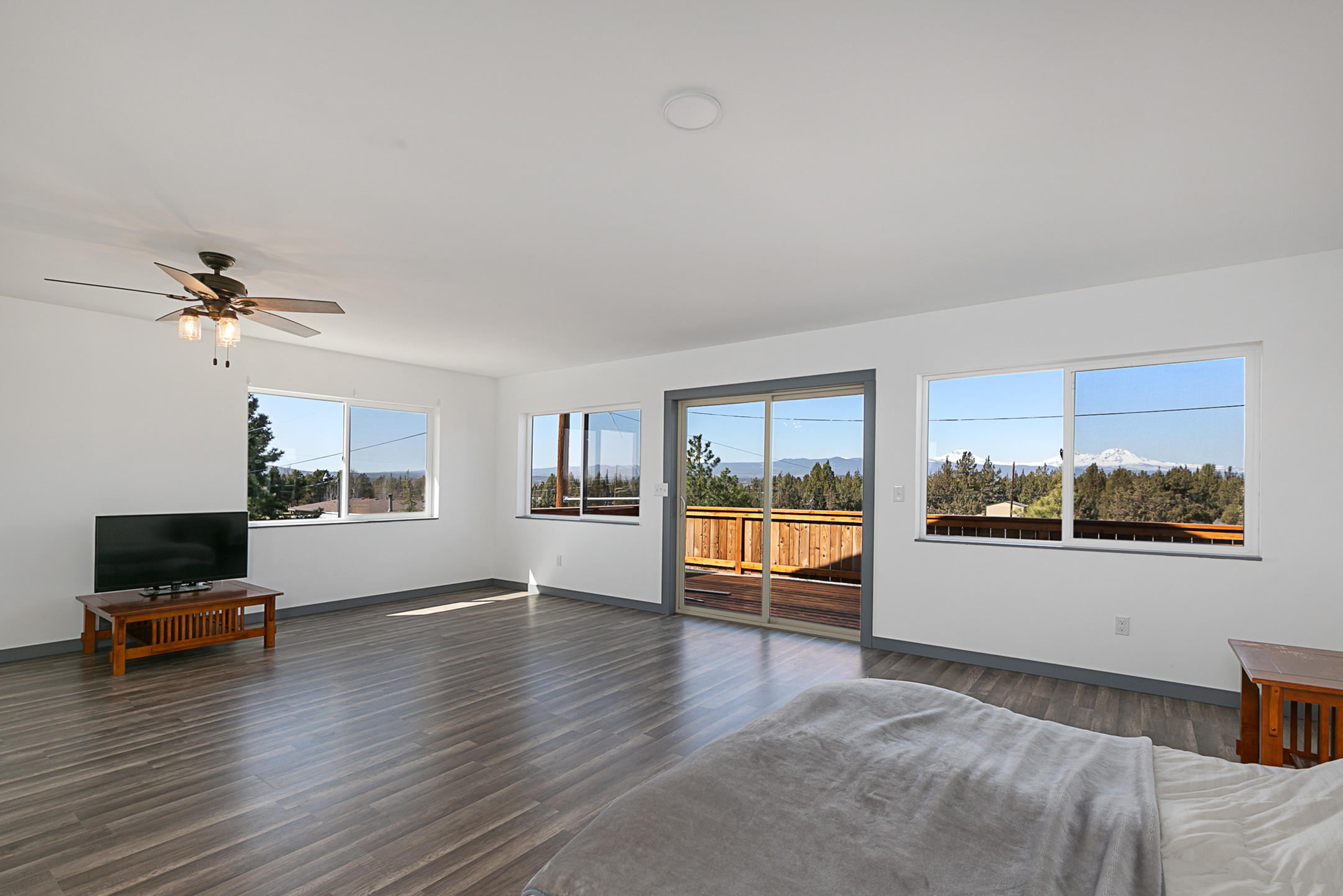 65158 Hunnell Road Bend, OR 97703 - Photo 17 of 31 a living room with furniture and a window