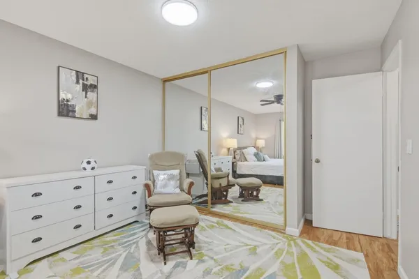 a bedroom with a bed and a view of bathroom