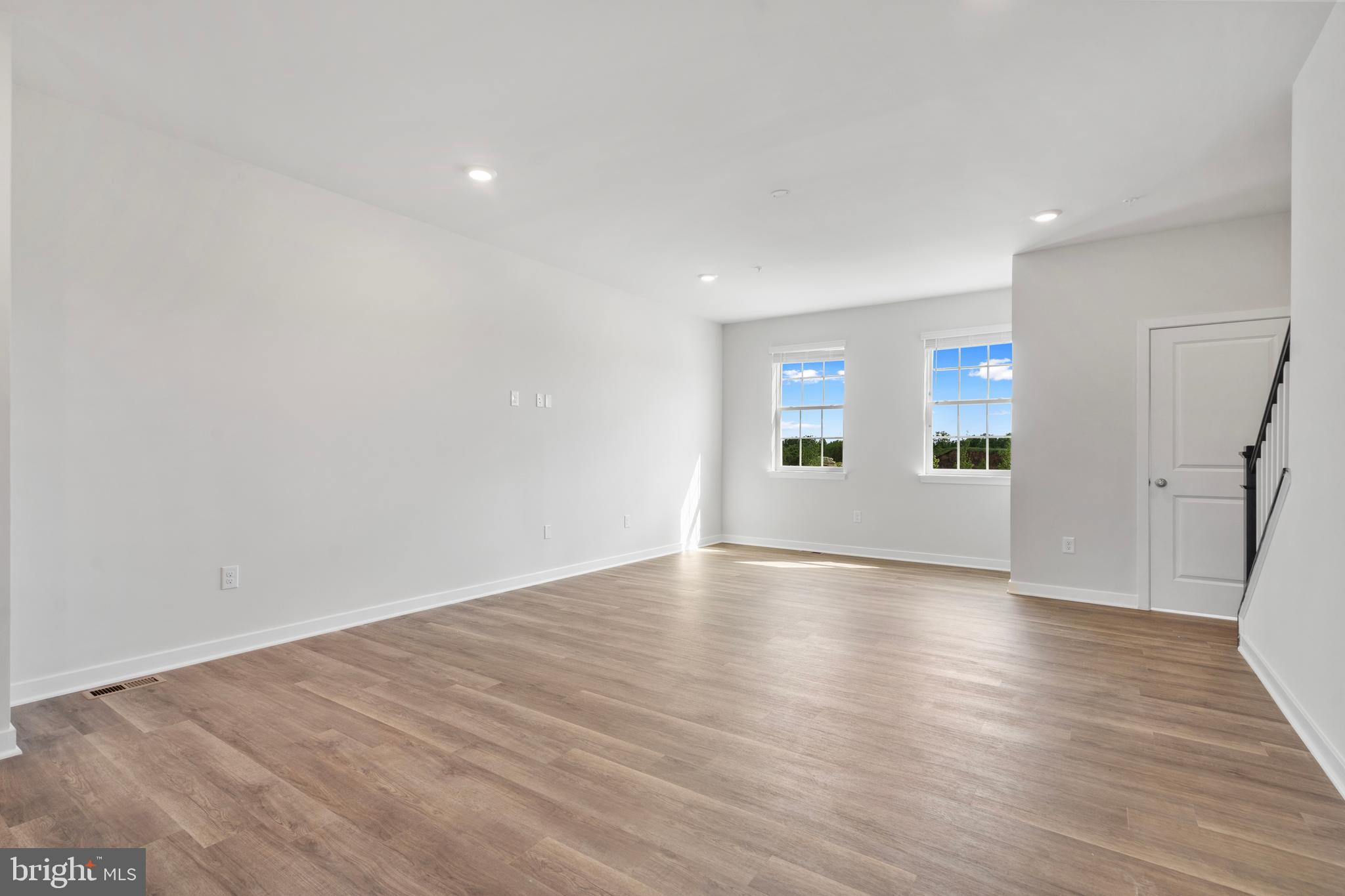 7514 Daybreak Drive Brandywine, MD 20613 - Photo 13 of 29 a view of a big room with wooden floor and windows