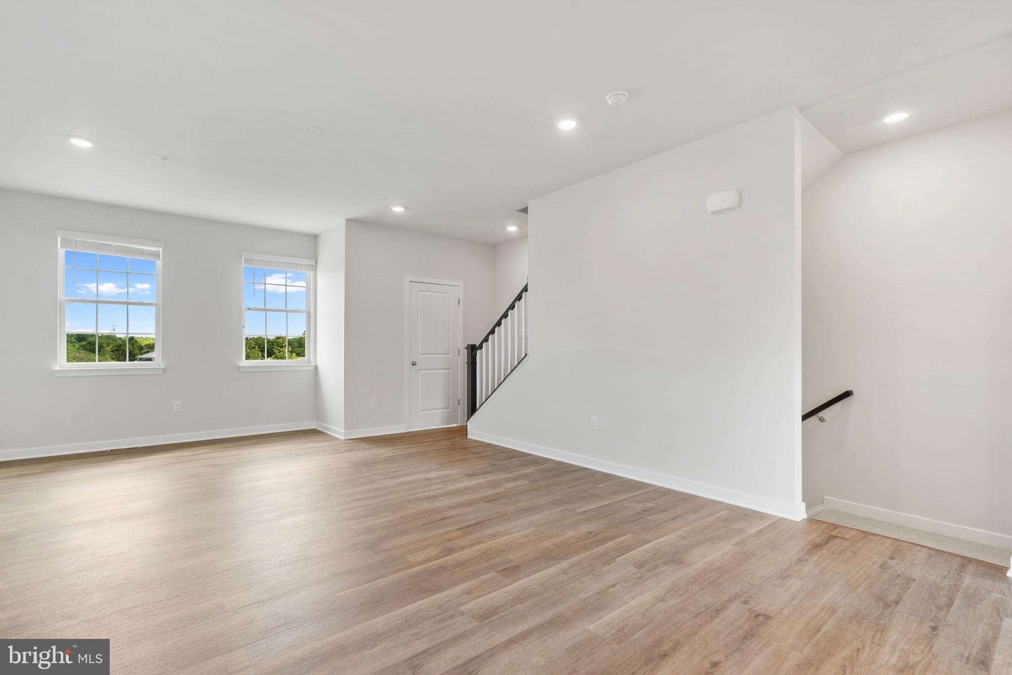 7514 Daybreak Drive Brandywine, MD 20613 - Photo 14 of 29 a view of empty room with wooden floor and window