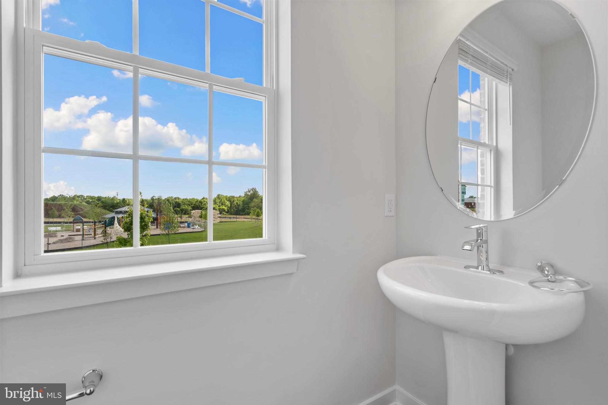 7514 Daybreak Drive Brandywine, MD 20613 - Photo 17 of 29 a bathroom with a sink and a mirror