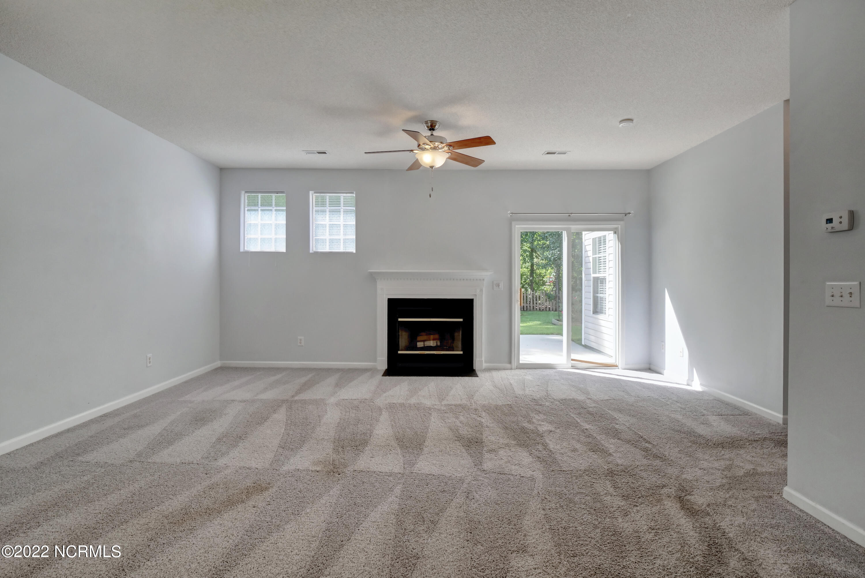 8683 Orchard Loop Road Leland, NC 28451 - Photo 5 of 35 Access to patio and fenced backyard