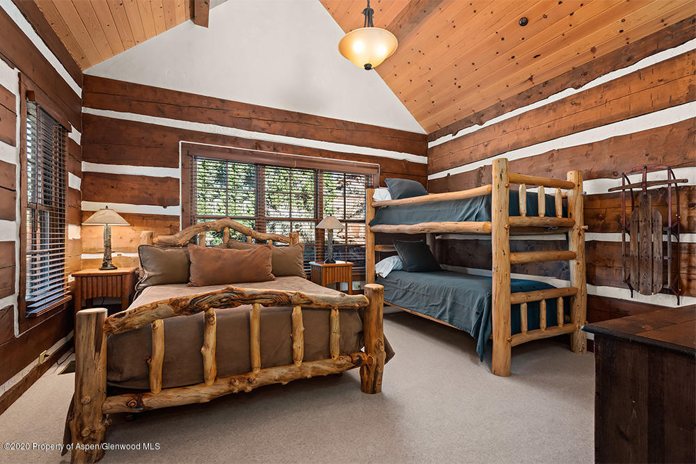 10 Arbaney Ranch Road Basalt, CO 81621 - Photo 13 of 16 a bedroom with furniture and a window