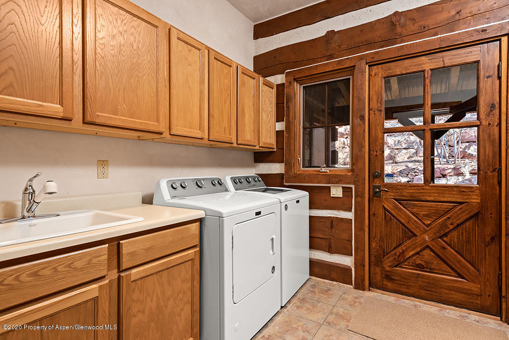 10 Arbaney Ranch Road Basalt, CO 81621 - Photo 15 of 16 a utility room with dryer and washer