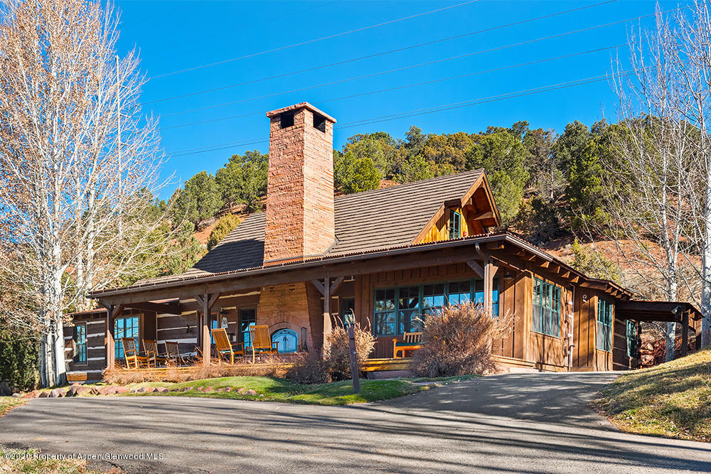 10 Arbaney Ranch Road Basalt, CO 81621 - Photo 16 of 16 a view of a building and a people on a street