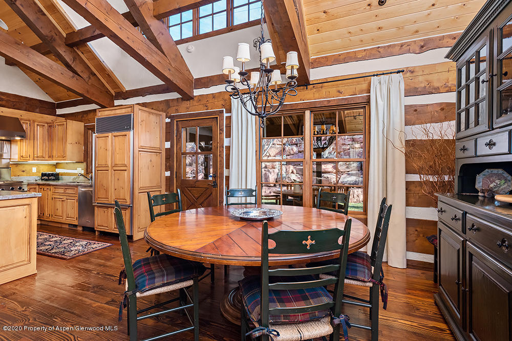10 Arbaney Ranch Road Basalt, CO 81621 - Photo 6 of 16 a view of a dining room with furniture and chandelier