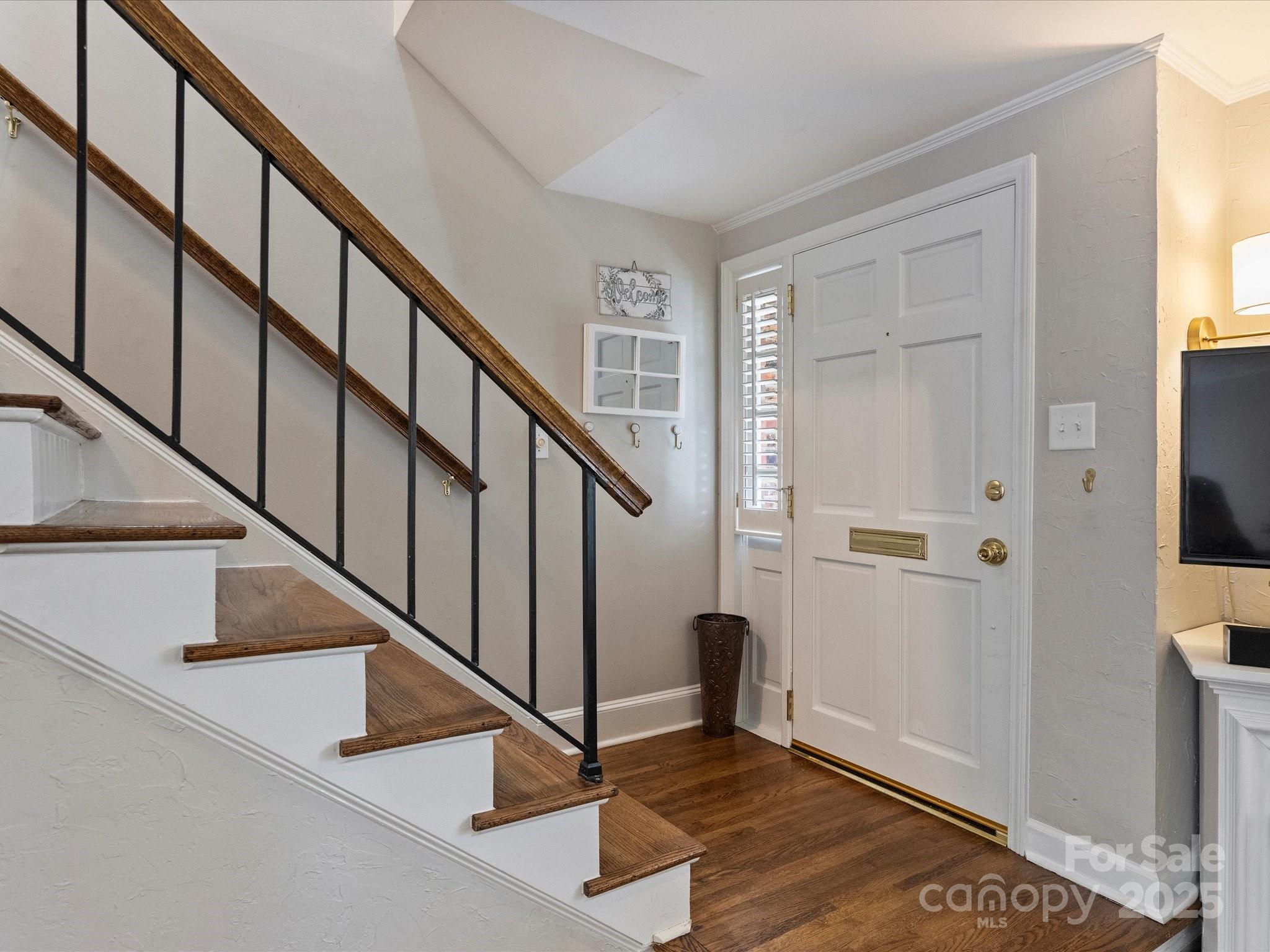 850 McAlway Road, Unit A Charlotte, NC 28211 - Photo 3 of 33 a view of an entryway with wooden floor