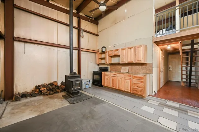 a kitchen with sink cabinets and outdoor view