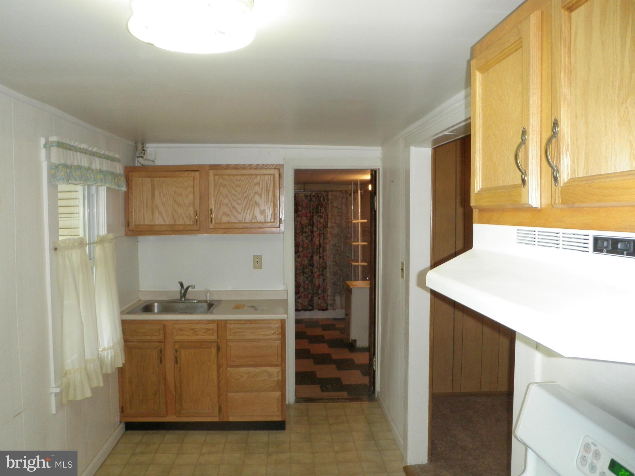 1329 Edna Road Pasadena, MD 21122 - Photo 10 of 24 Kitchen