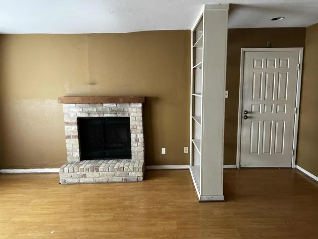 a view of a livingroom with a fireplace