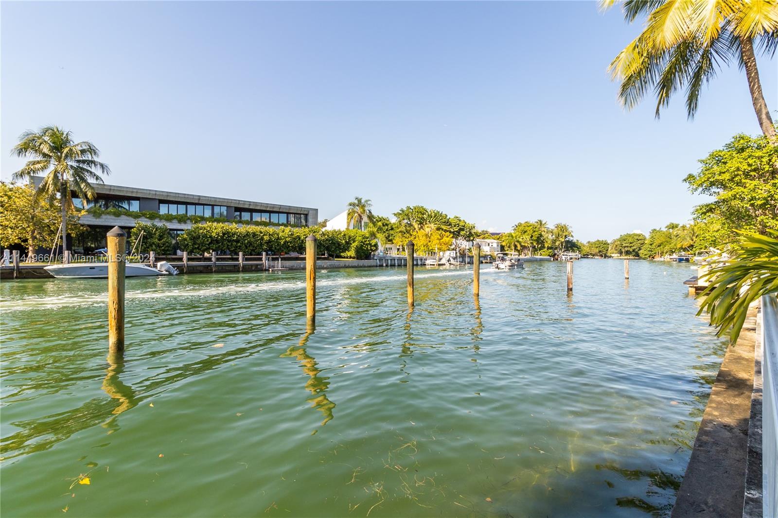4800 Pine Tree Drive, Unit 101 Miami Beach, FL 33140 - Photo 23 of 30 a view of water pond with yard
