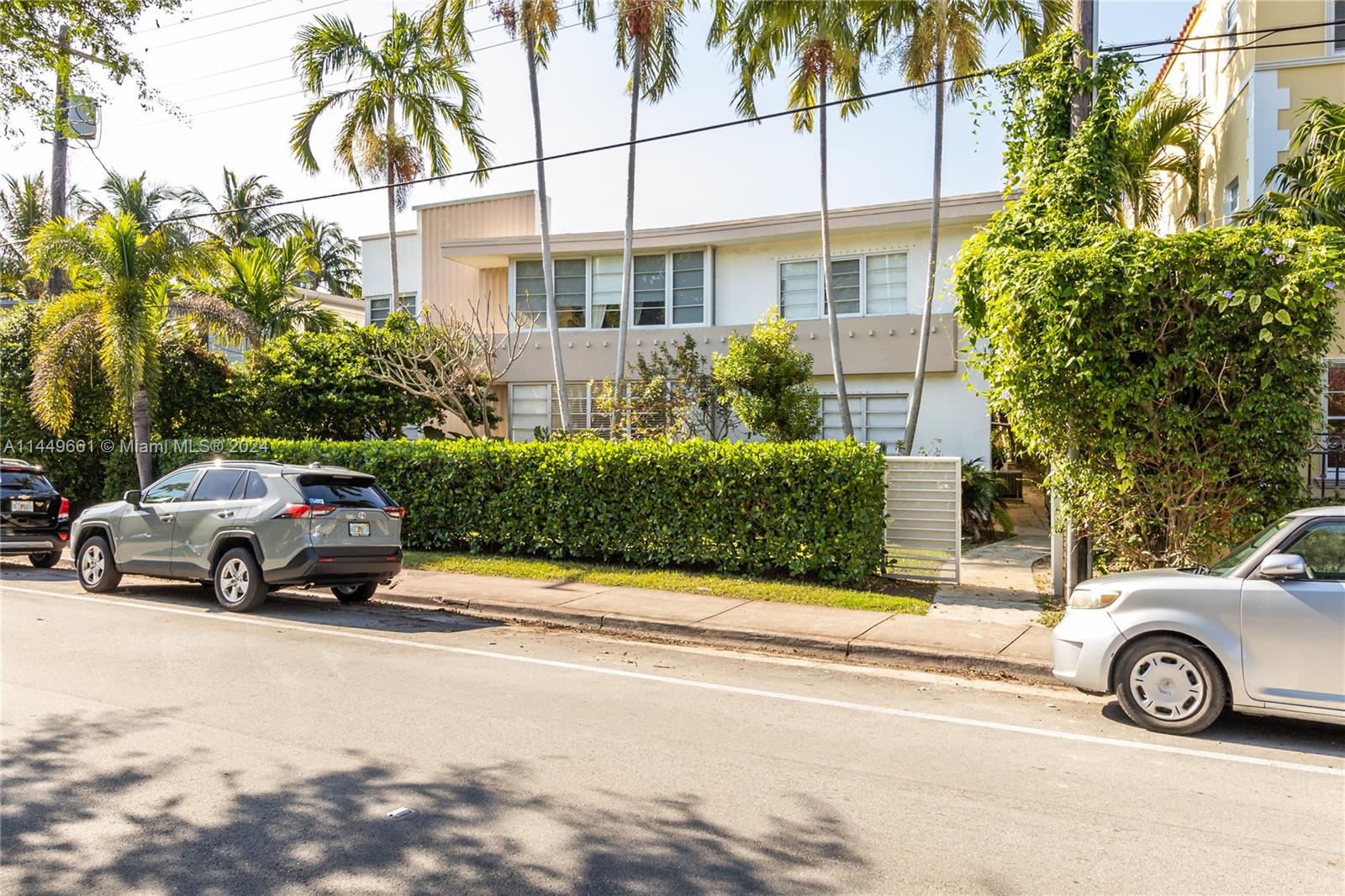 4800 Pine Tree Drive, Unit 101 Miami Beach, FL 33140 - Photo 30 of 30 a car parked in front of a house