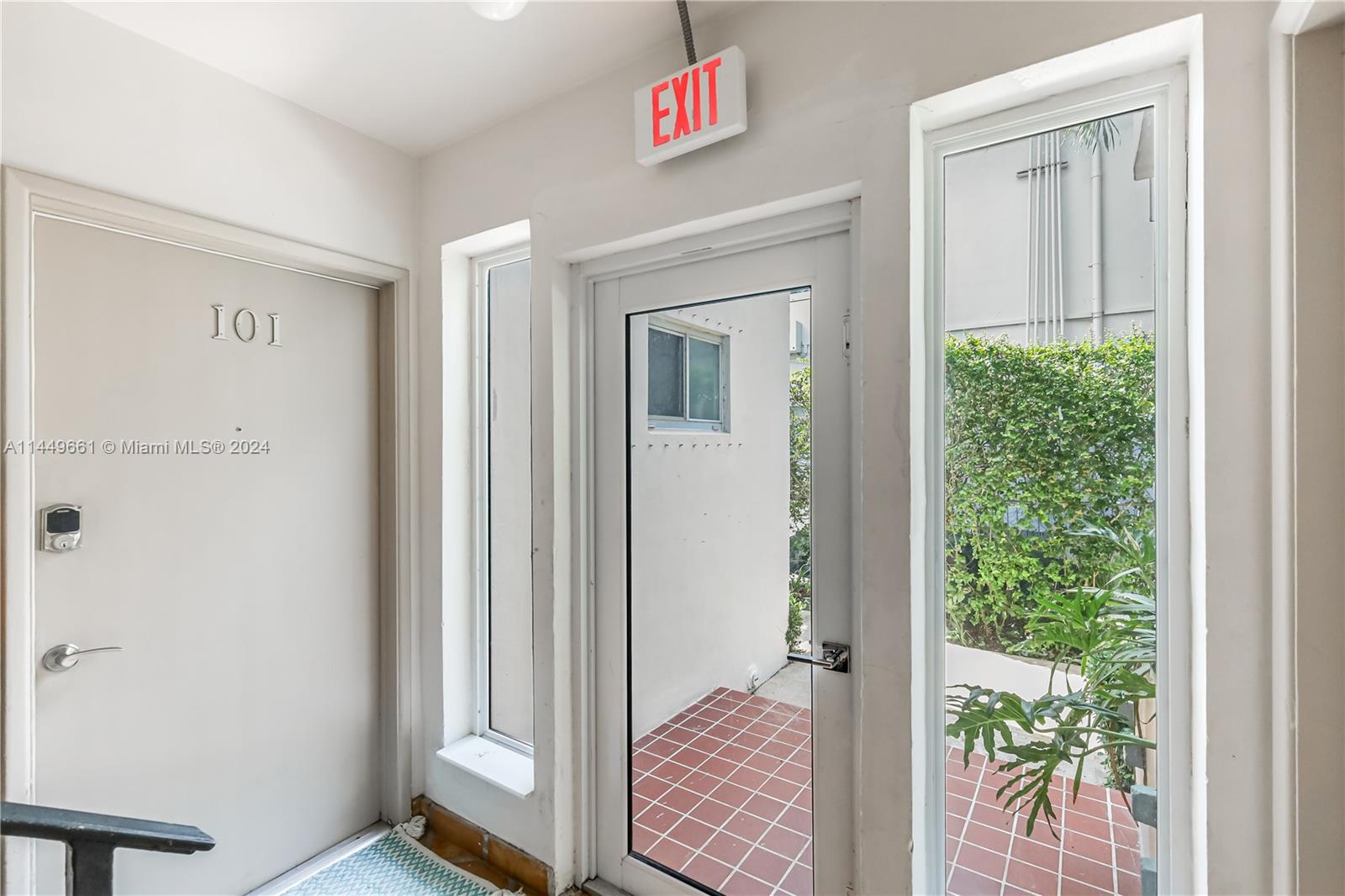 4800 Pine Tree Drive, Unit 101 Miami Beach, FL 33140 - Photo 3 of 30 a view of a hallway with closet area