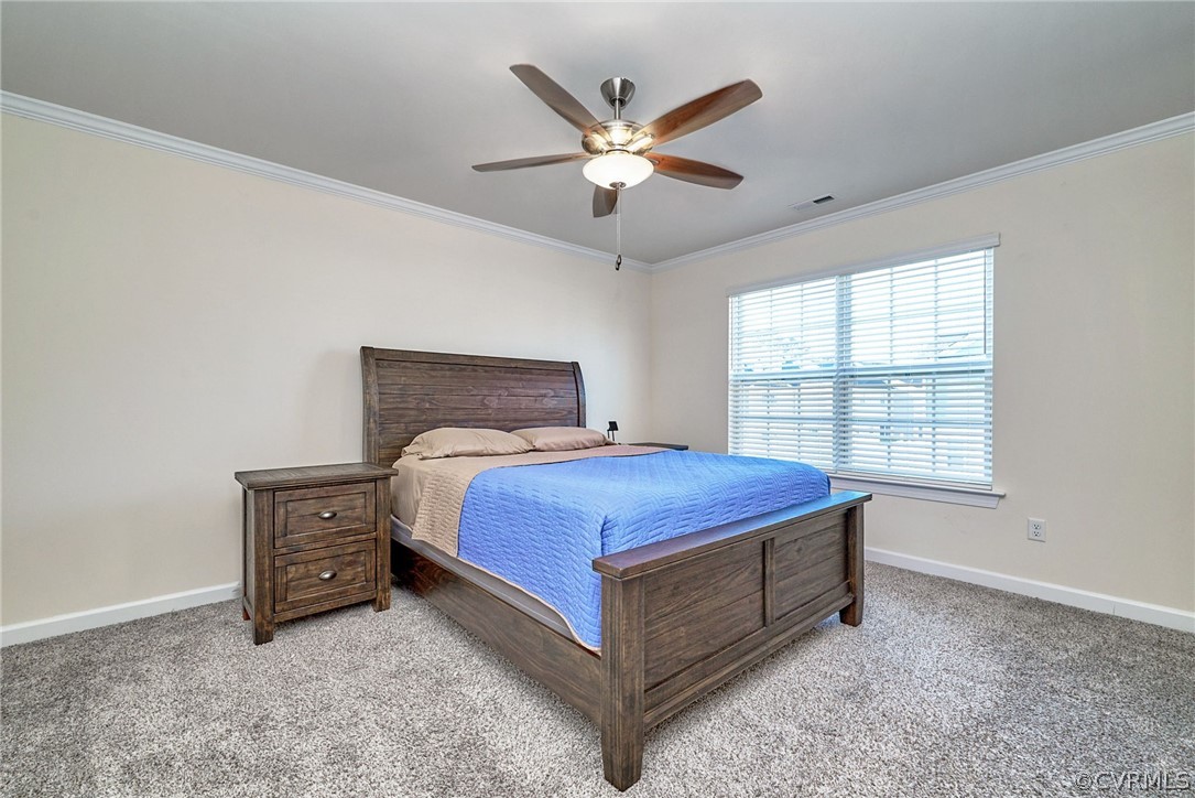 114 Two Penny Place Williamsburg, VA 23185 - Photo 19 of 25 a bedroom with a bed and window