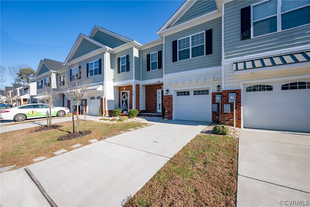114 Two Penny Place Williamsburg, VA 23185 - Photo 3 of 25 a front view of a building with street