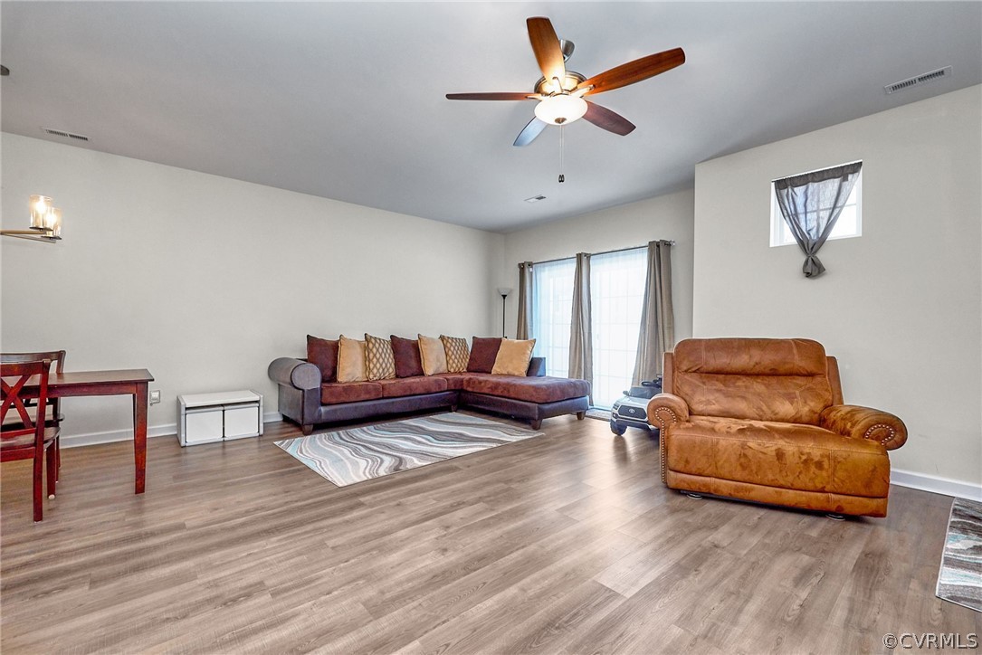 114 Two Penny Place Williamsburg, VA 23185 - Photo 10 of 25 a living room with furniture and wooden floor