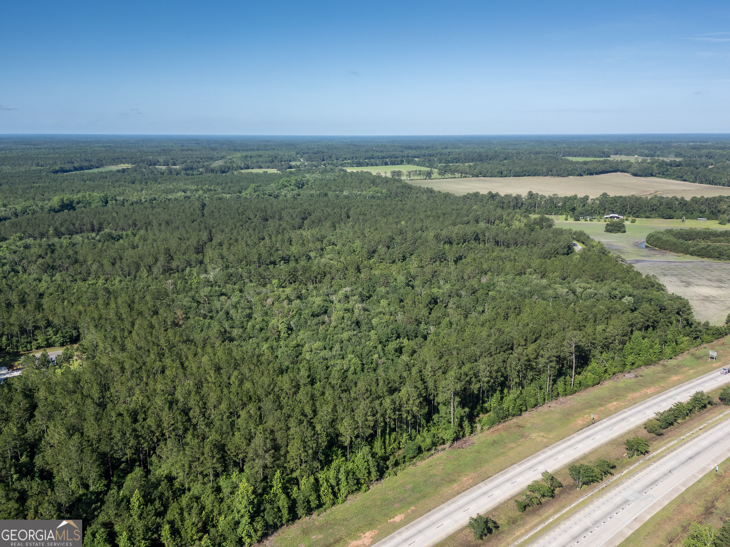 5185 Old Groveland Road Pembroke, GA 31321 - Photo 13 of 25 a view of city with tall buildings