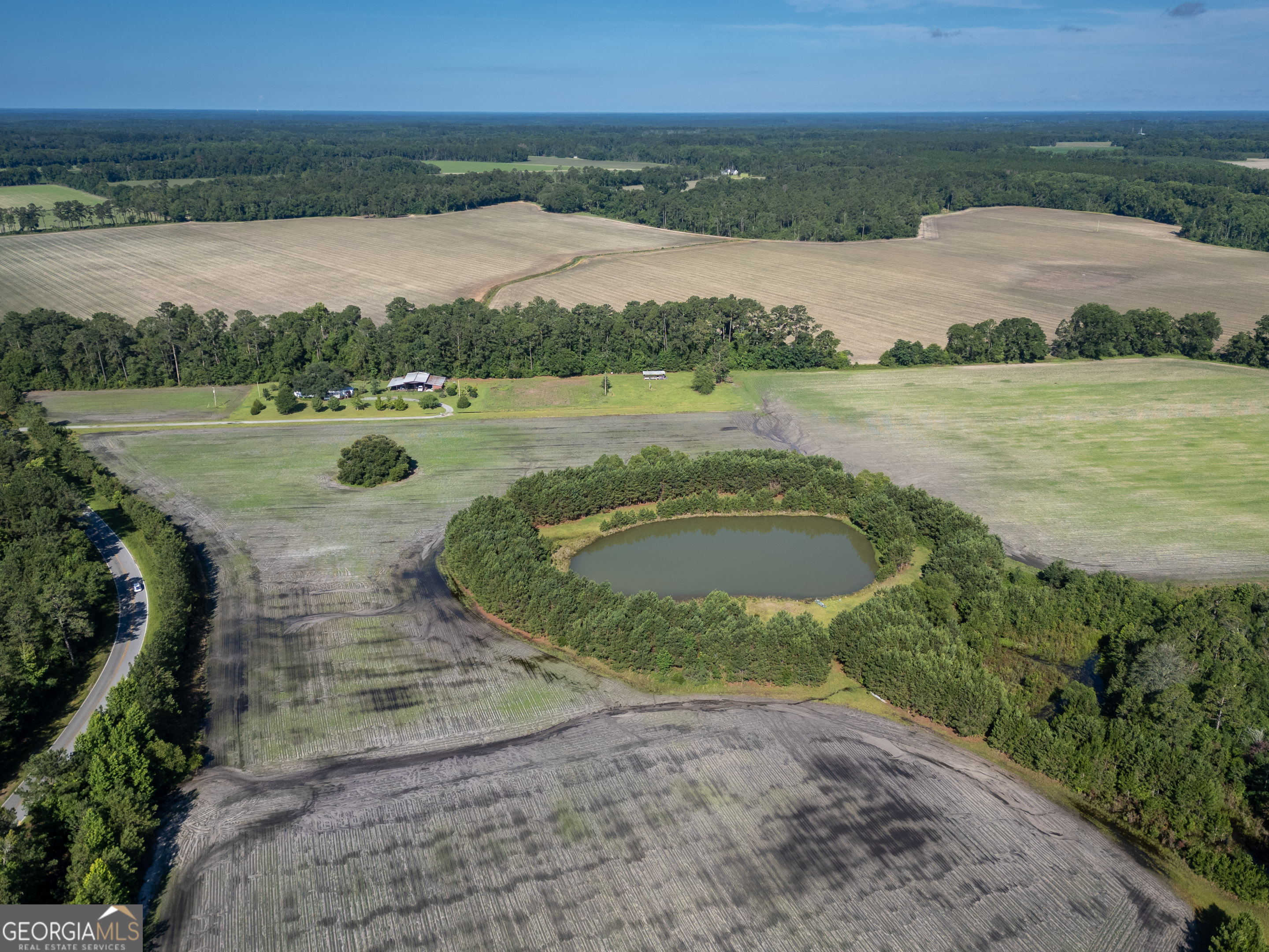 5185 Old Groveland Road Pembroke, GA 31321 - Photo 15 of 25 an aerial view of a house and lake view
