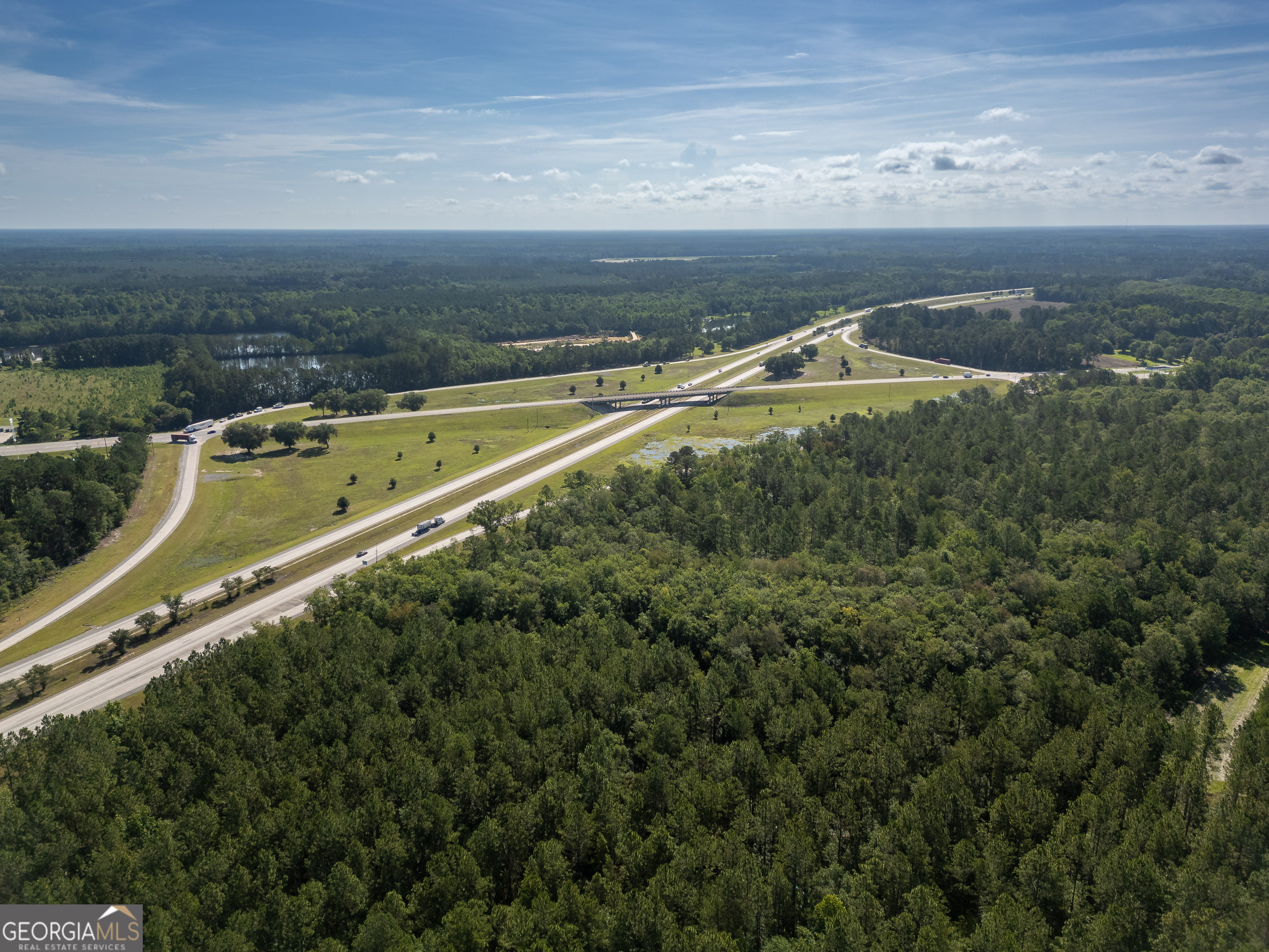 5185 Old Groveland Road Pembroke, GA 31321 - Photo 22 of 25 an aerial view of a city
