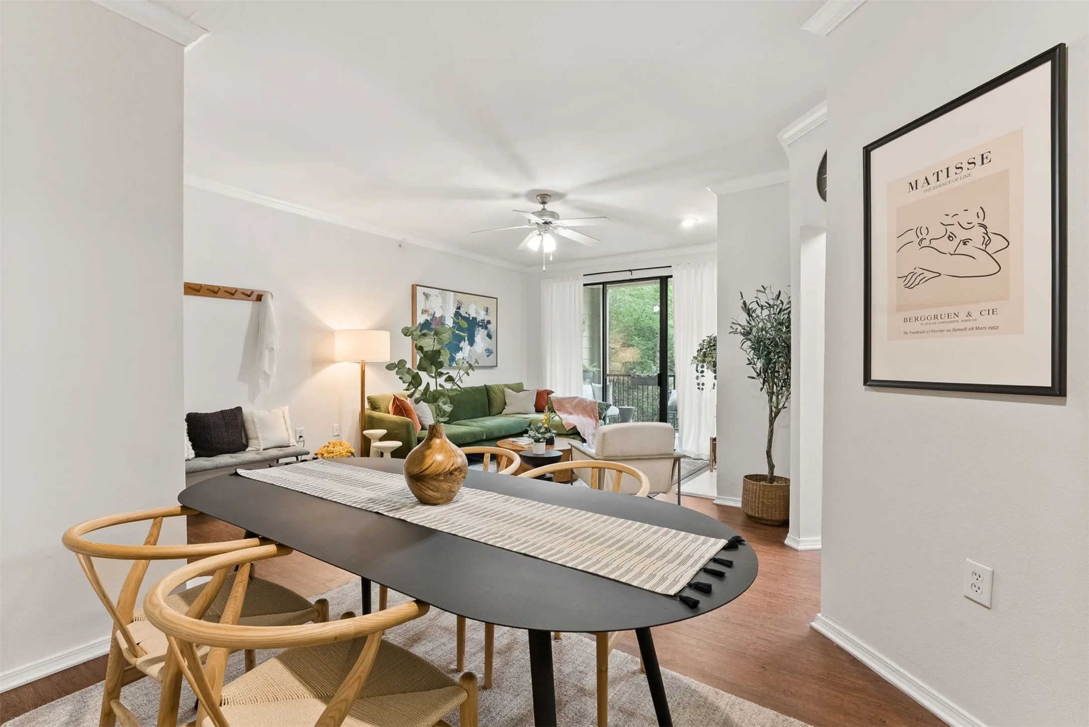 3401 West Parmer Lane, Unit 313 Austin, TX 78727 - Photo 12 of 16 a living room with dining table and wooden floor