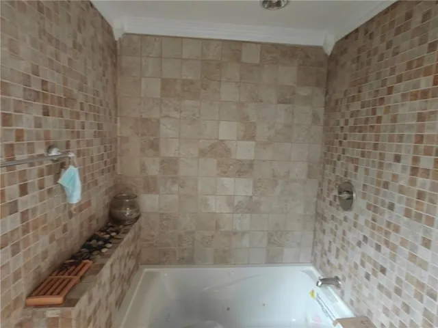 a bathroom with a bathtub