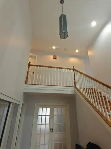 a view of entryway and hall with a window