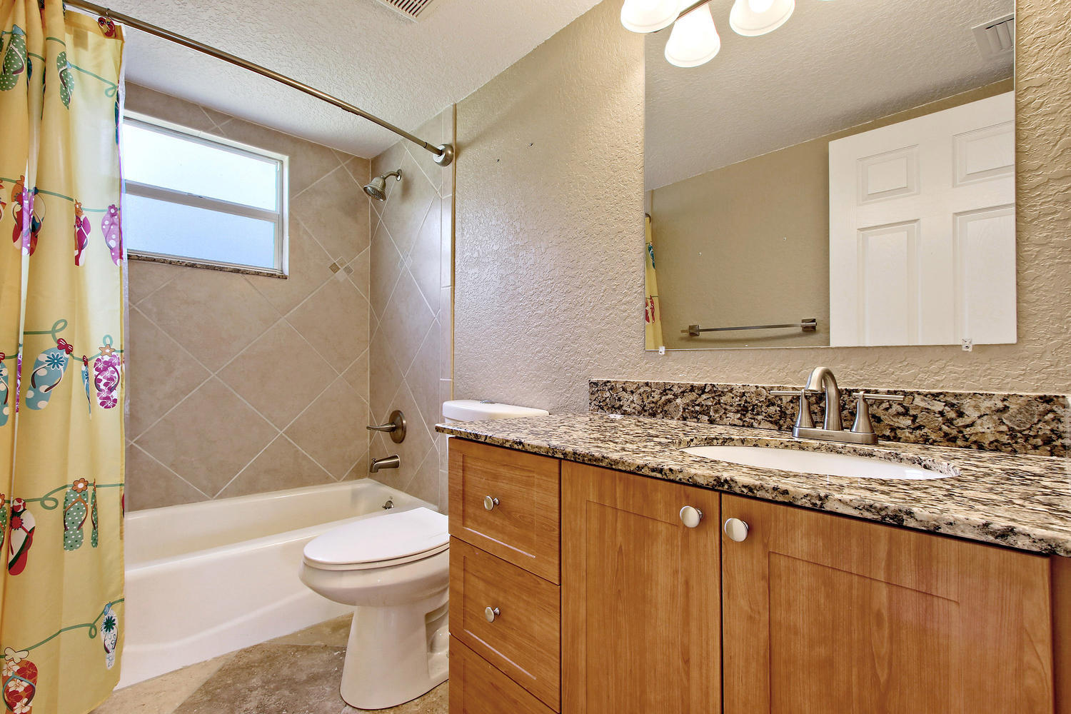 13783 153rd Road North Jupiter, FL 33478 - Photo 11 of 22 Full Bath Downstairs for bedrooms 2 and