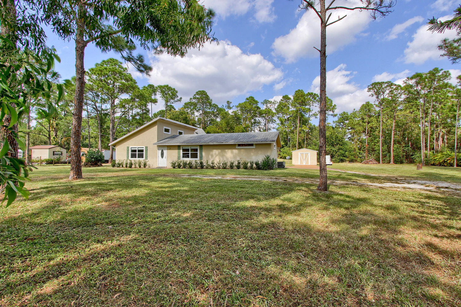 13783 153rd Road North Jupiter, FL 33478 - Photo 2 of 22 Front of Home