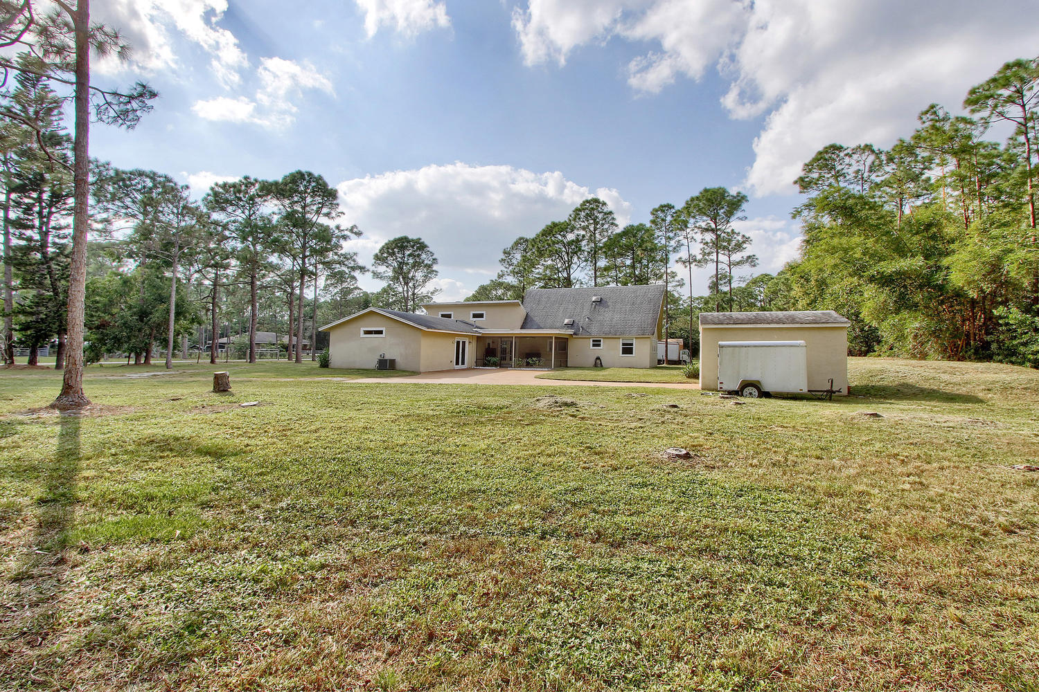 13783 153rd Road North Jupiter, FL 33478 - Photo 21 of 22 Back Yard with Shed