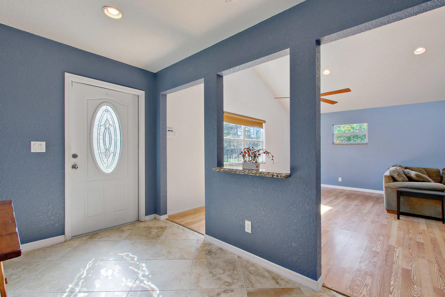 13783 153rd Road North Jupiter, FL 33478 - Photo 4 of 22 Foyer into Living Room