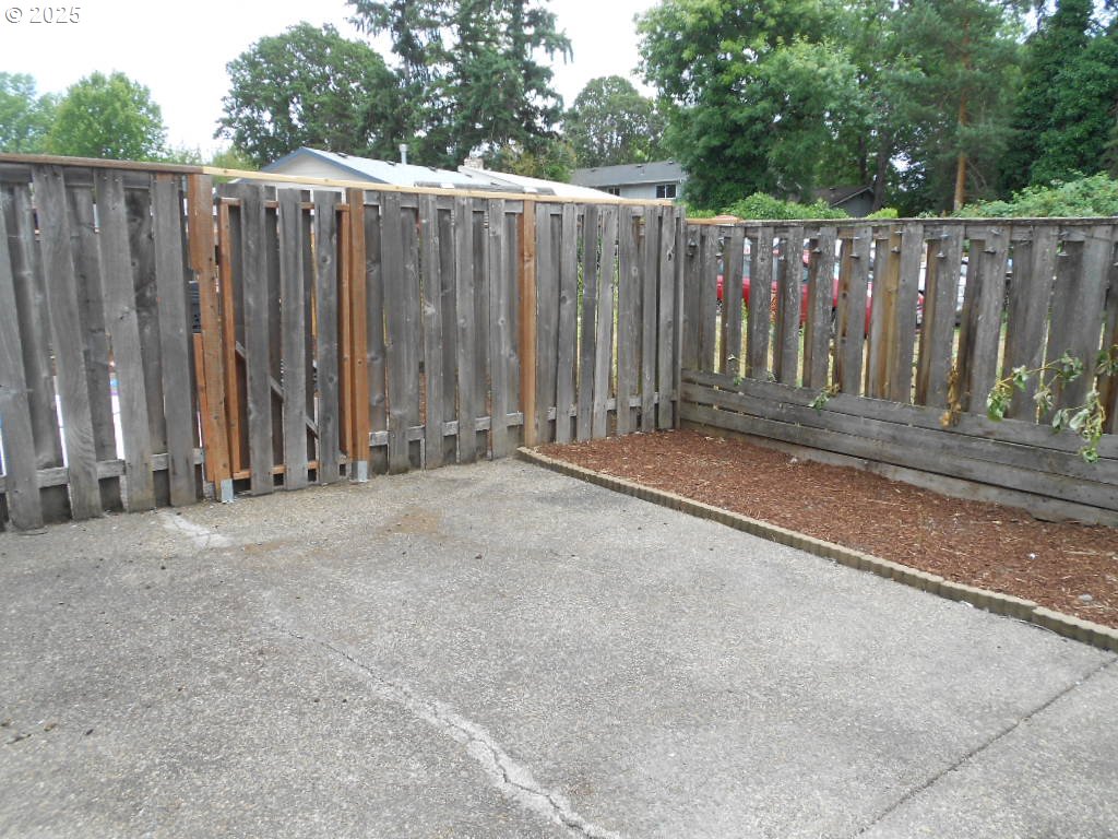 18440 Southwest Johnson Street Beaverton, OR 97003 - Photo 10 of 10 a view of wooden fence