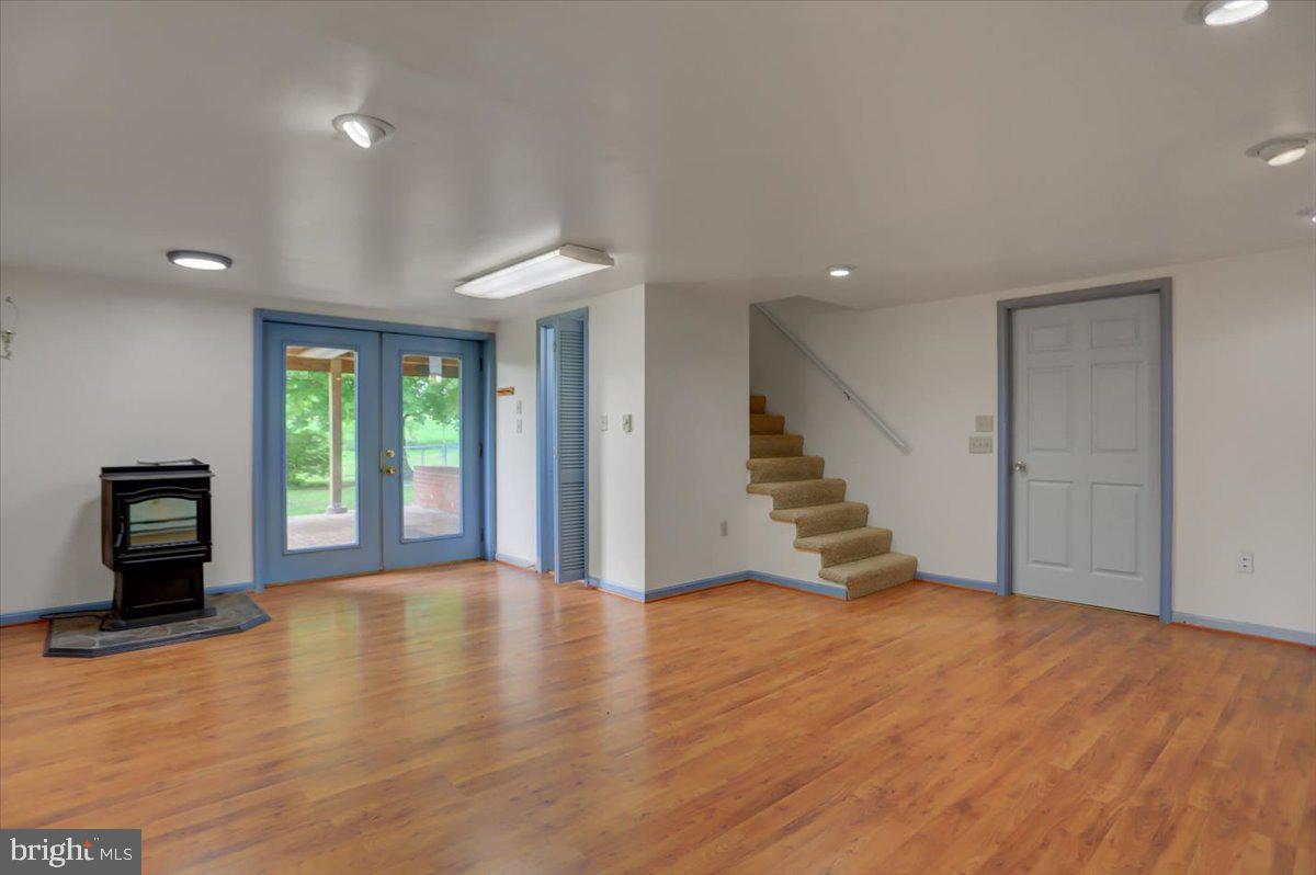 3187 Keller Road St. Thomas, PA 17252 - Photo 22 of 40 LL family room w/pellet stove