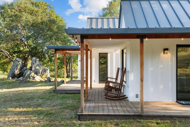 an aerial view of residential house with outdoor space