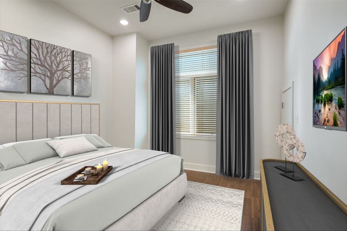 1702 South Lamar Boulevard, Unit 22 Austin, TX 78704 - Photo 13 of 30 a bedroom with a bed and a flat screen tv