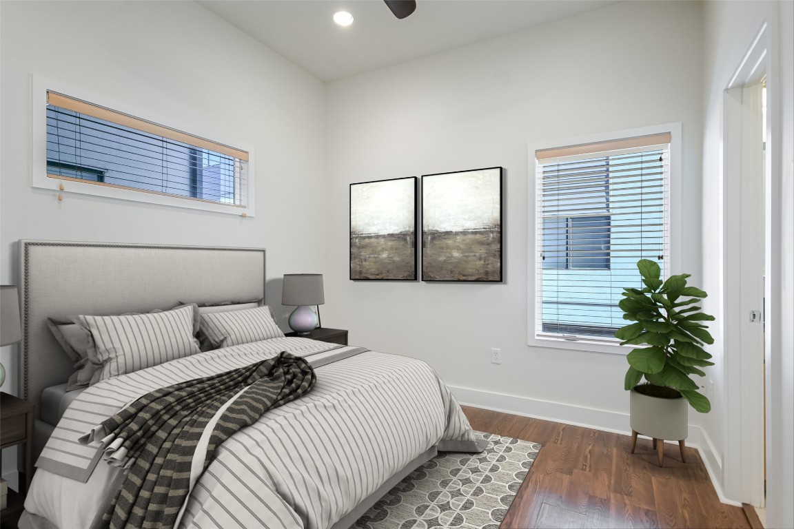 1702 South Lamar Boulevard, Unit 22 Austin, TX 78704 - Photo 17 of 30 a bedroom with a large bed and a potted plant