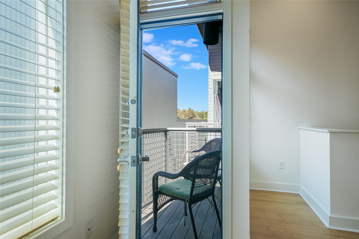 1702 South Lamar Boulevard, Unit 22 Austin, TX 78704 - Photo 22 of 30 a view of a hallway with seating area