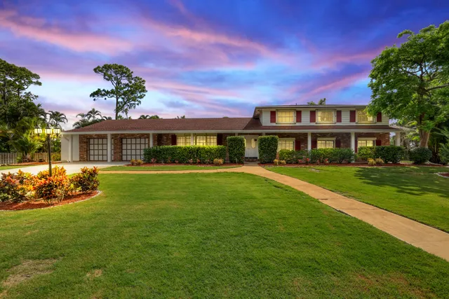 a view of a house with a swimming pool