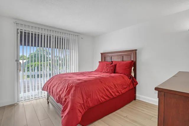 a view of storage and utility room with washer and dryer