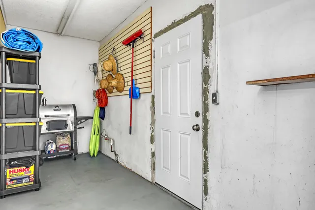 an aerial view of residential building and lake