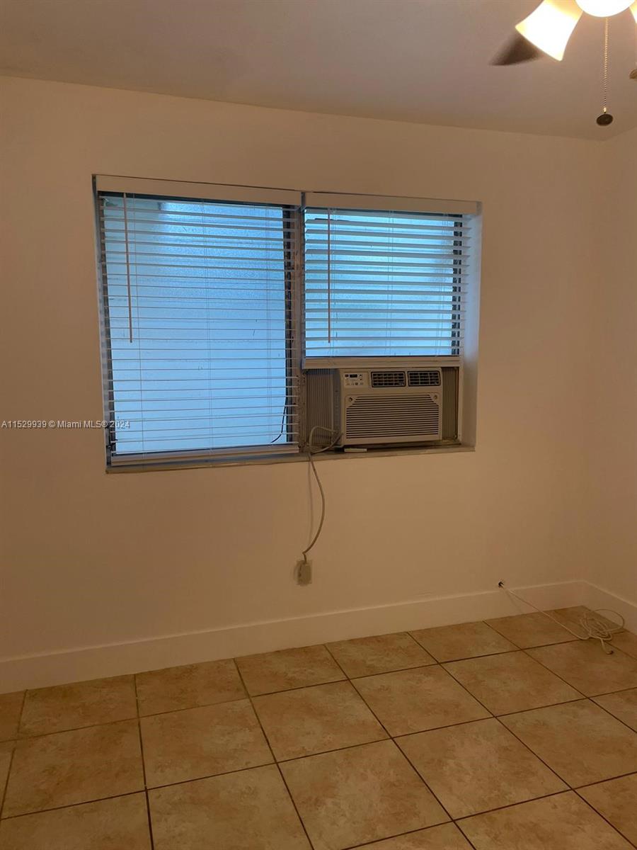527 Southwest 10th Street, Unit 3 Miami, FL 33130 - Photo 7 of 10 a room with a window