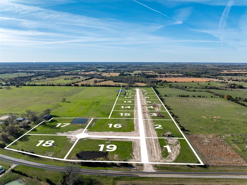 123 Private Road Brookston, TX 75421 - Photo 2 of 10 a view of a tennis court