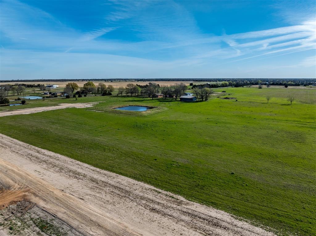 123 Private Road Brookston, TX 75421 - Photo 3 of 10 a view of a field with an ocean