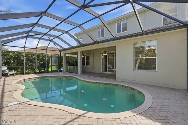 a view of a house with a swimming pool