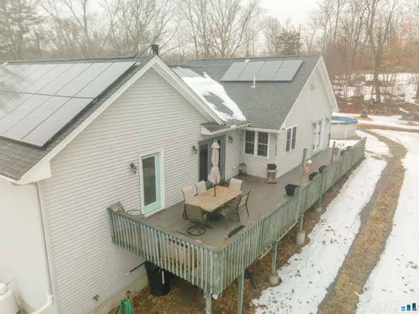 a view of a house next to a yard