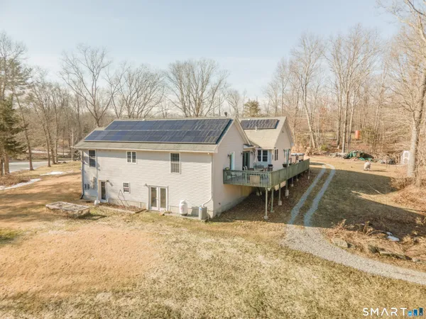 a house with trees in front of it