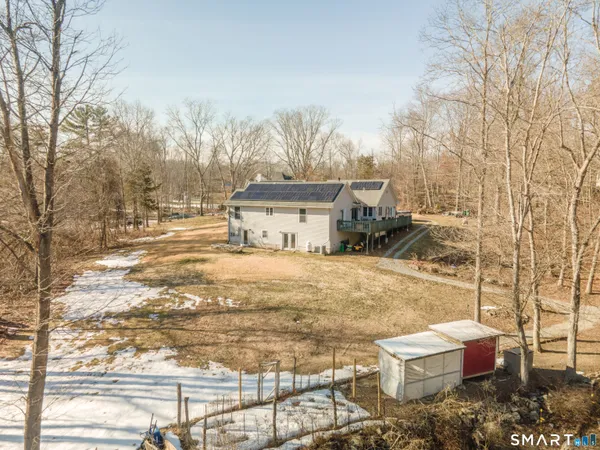 a house view with a outdoor space