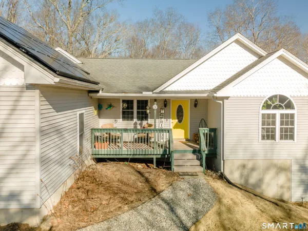 a front view of a house with a balcony